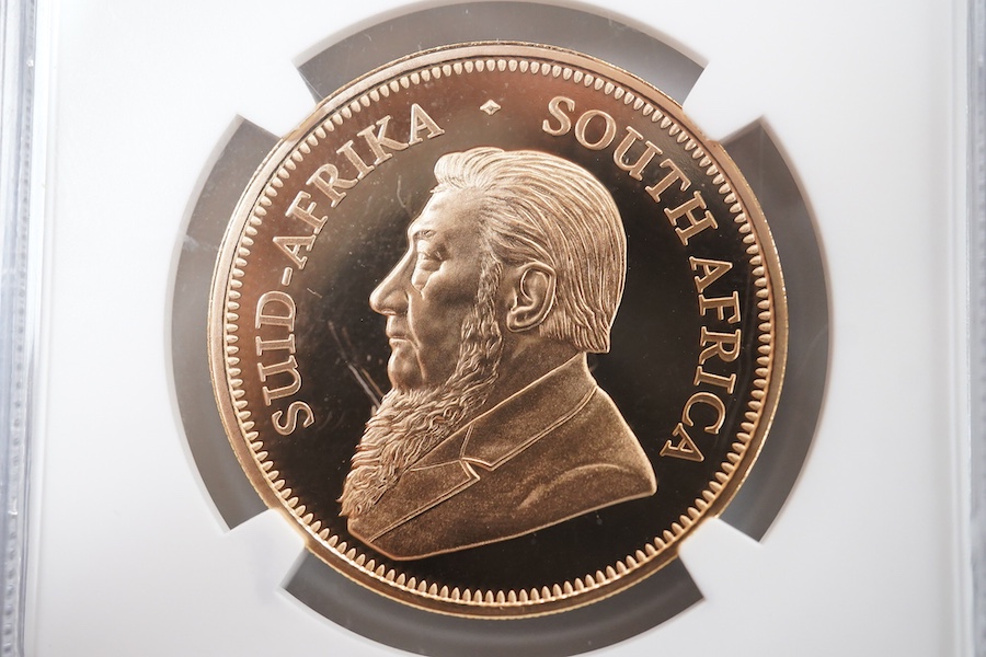 Gold coins, South Africa, 1oz. gold Krugerrand, 2017, NGC encapsulated and graded PF 69 ultra cameo, plastic case scratched
